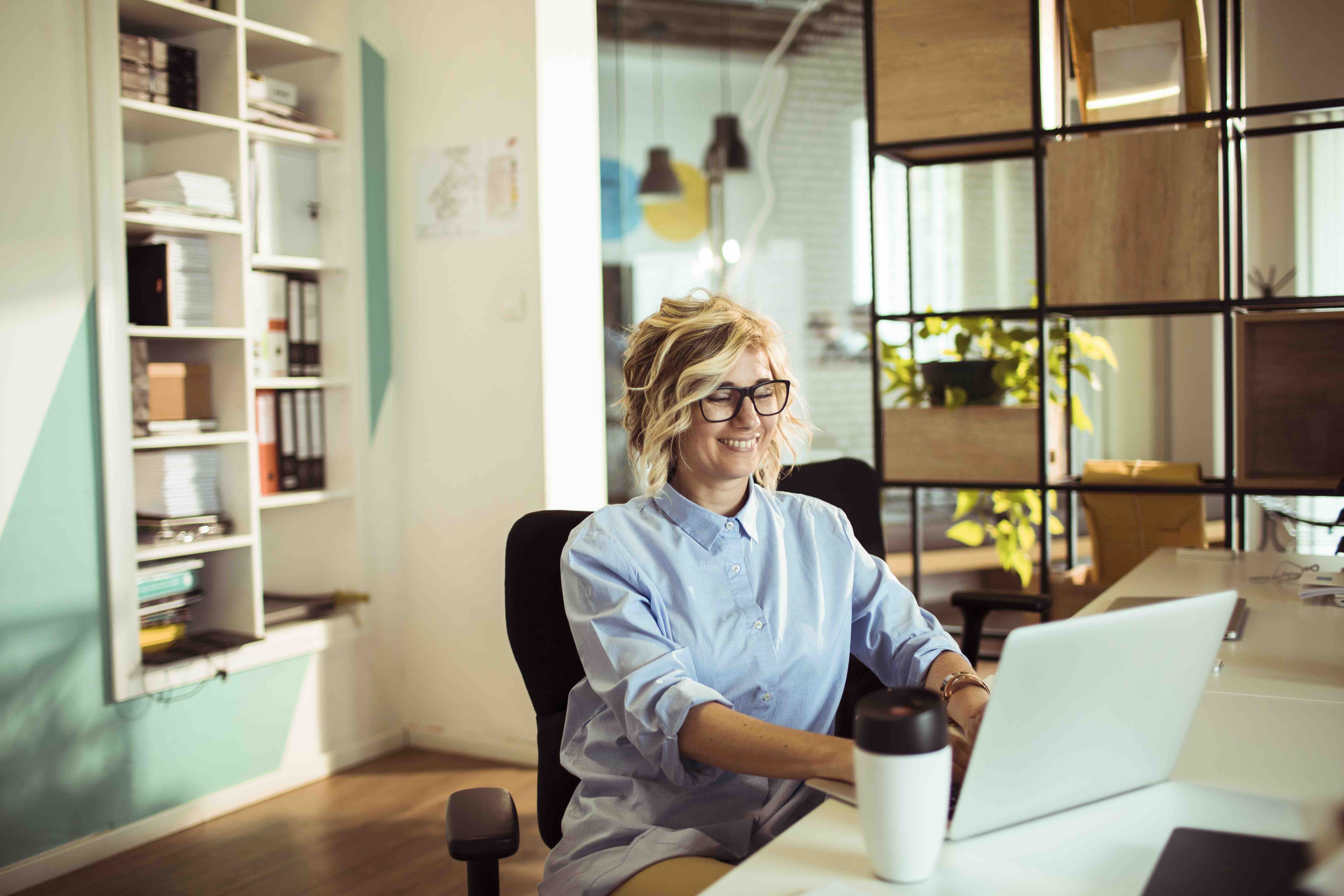 middle aged woman using computer